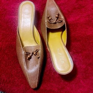 Women’s Cocoa colored leather slides size 8.5 never been worn.